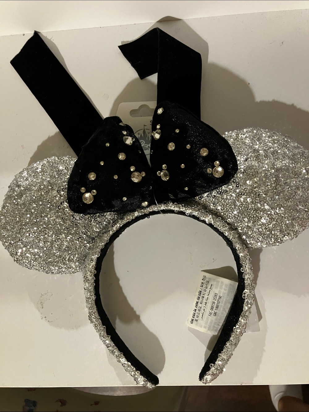 Disney Silver Sequin Minnie Ears Headband with Black Jeweled Bow